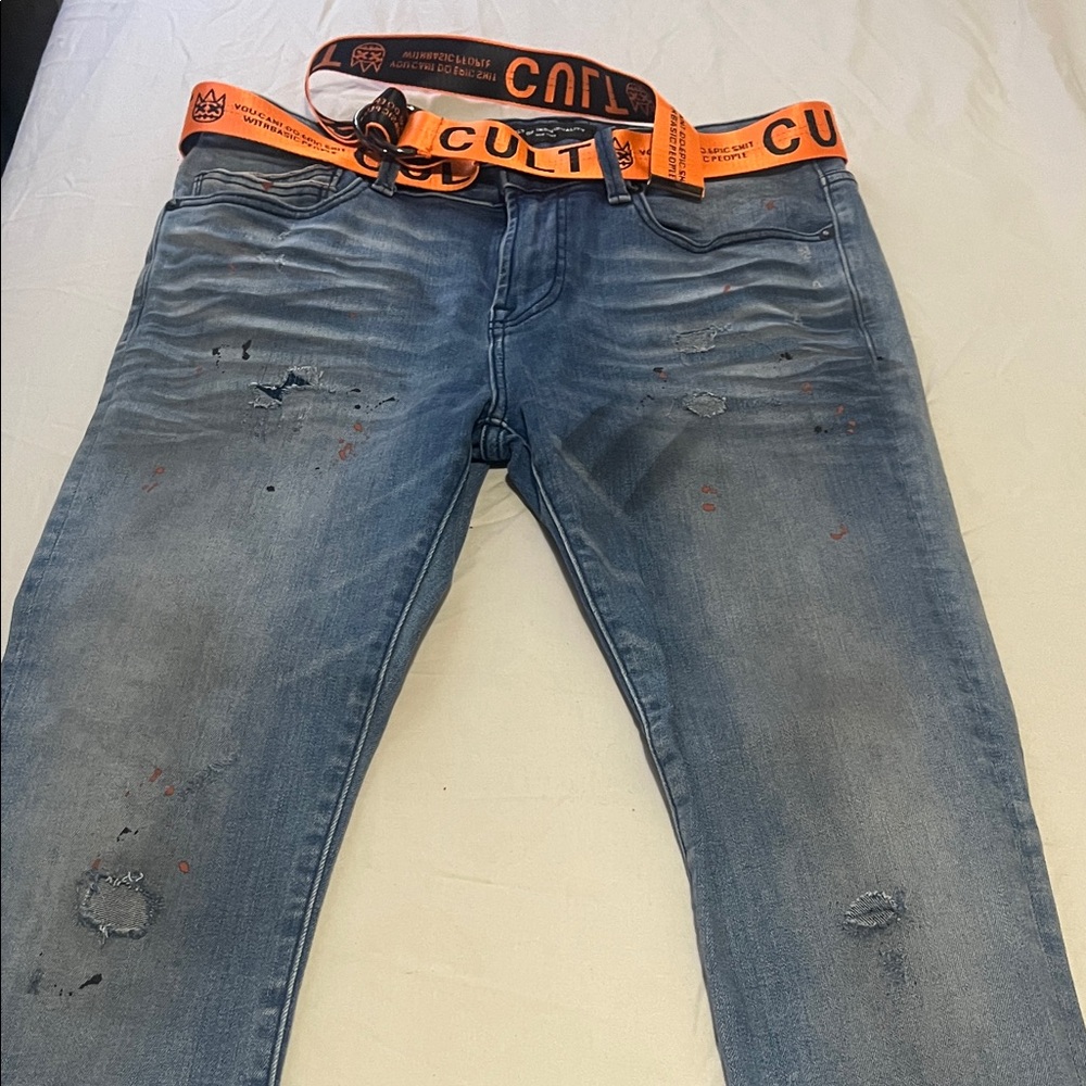 Cult of Individuality Distressed Blue Jeans with Bold Orange Belt - Picture 2 of 2